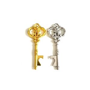 gold and silver key charms